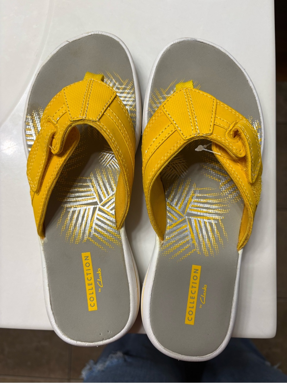 Clark’s Yellow Flip Flops